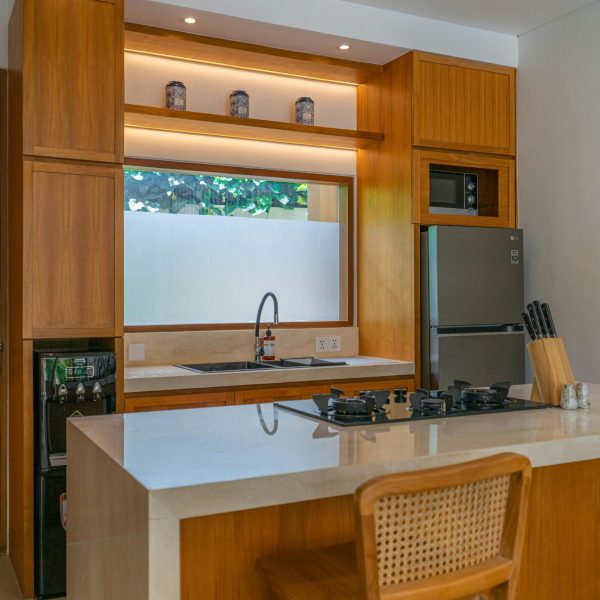 Modular kitchen design with wooden finish